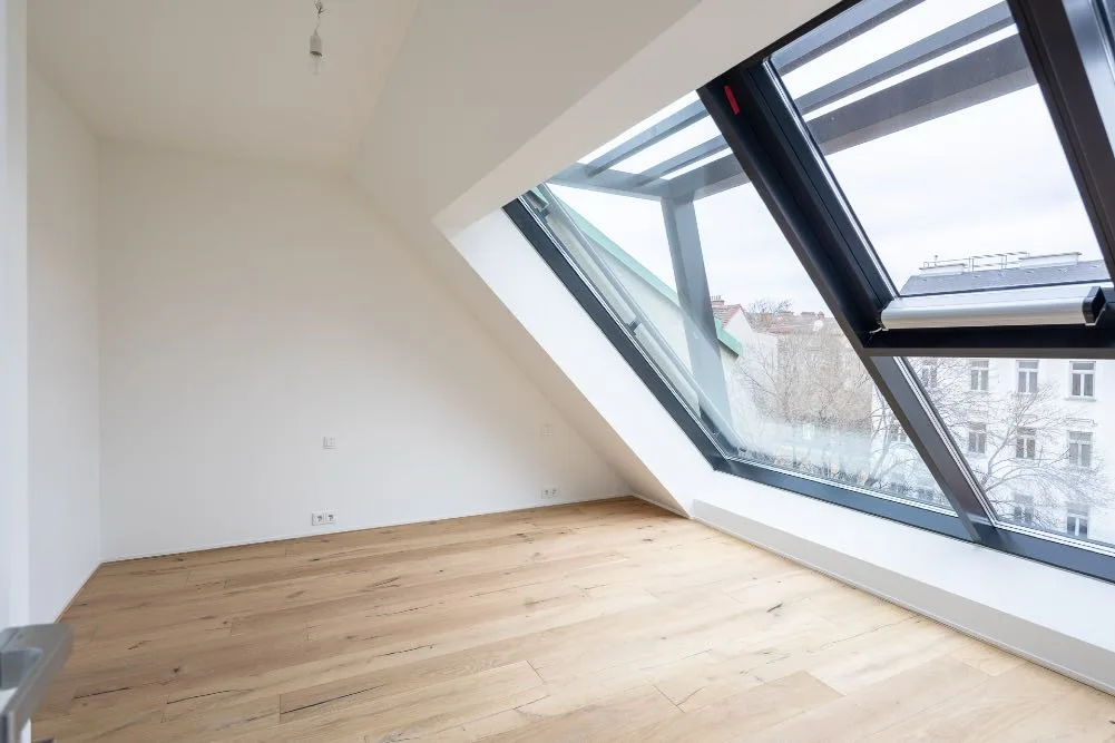 Dachgeschoss – Zimmer mit Dachflächenfenster